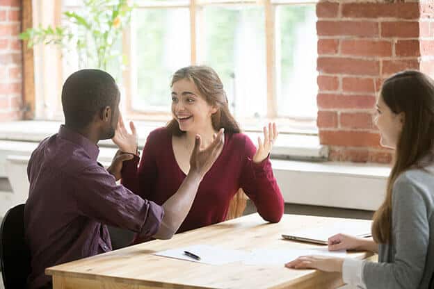 Image of a happy excited couple after signing their real estate deal
